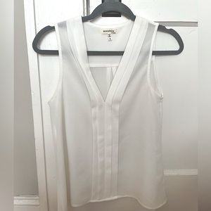 White sleeveless blouse